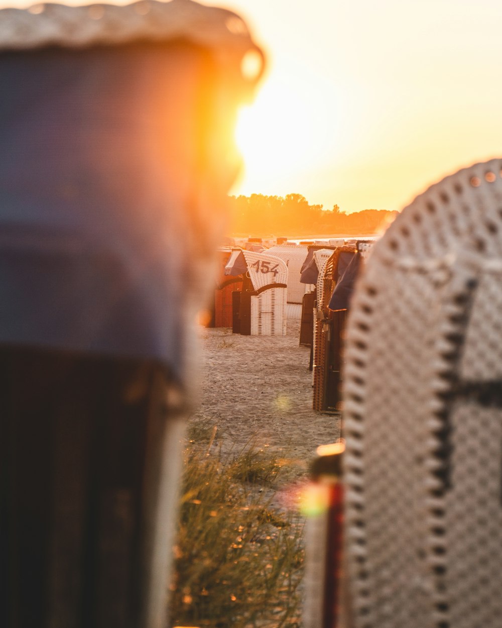 white round fan on green grass field during sunset