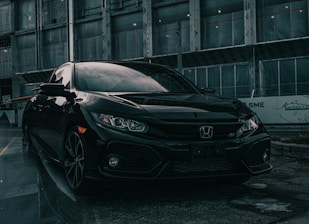 black honda accord on premium car tyres parked in front of building in nigeria
