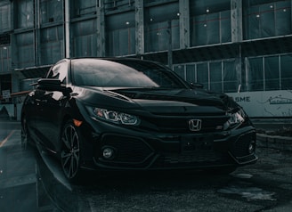 black mercedes benz c class parked on road