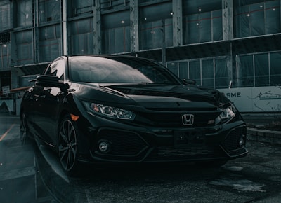 black honda accord on premium car tyres parked in front of building in nigeria