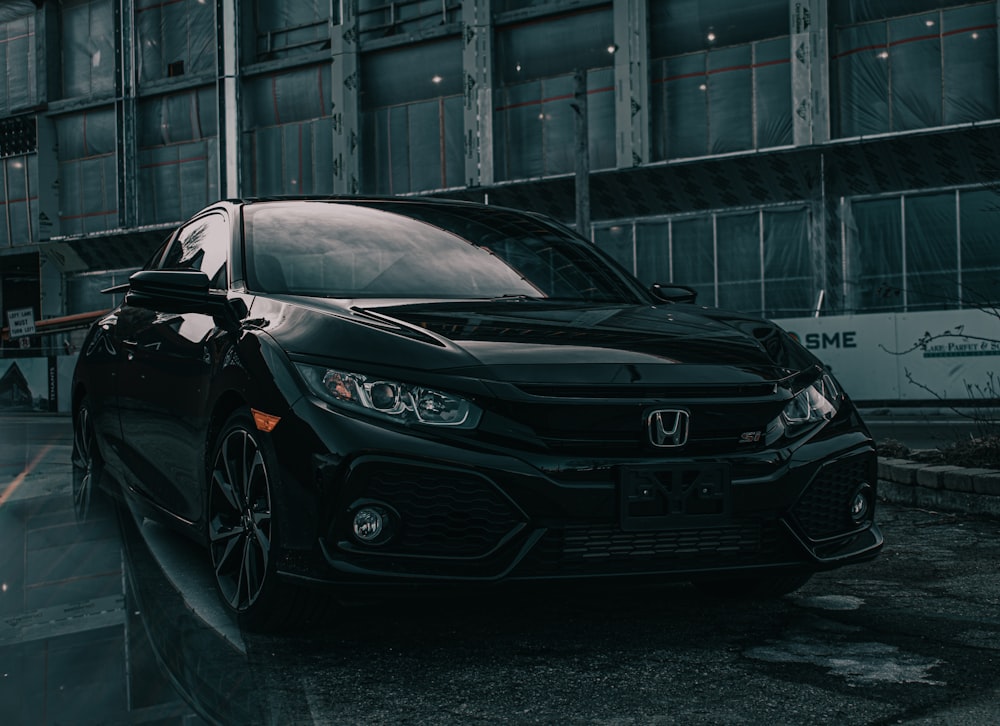 black mercedes benz c class parked on road