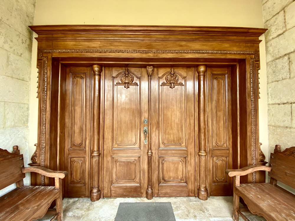 brown wooden door with white concrete floor