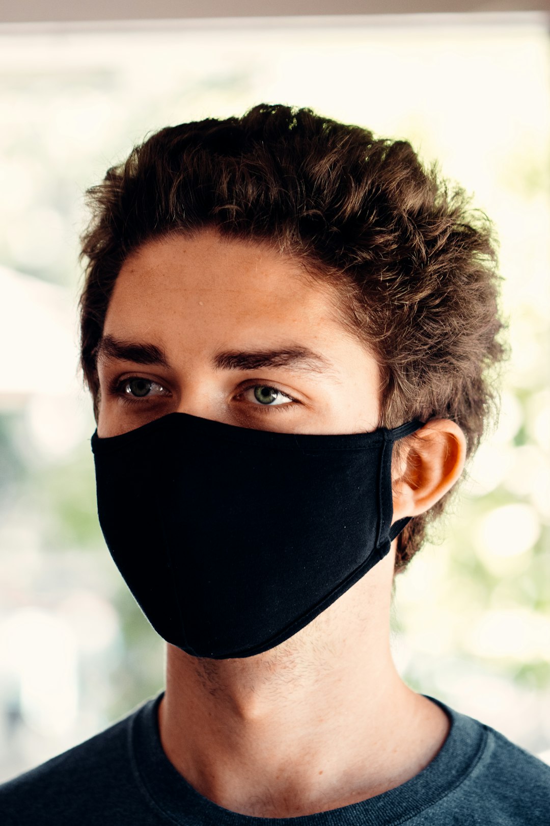 man in black face mask
