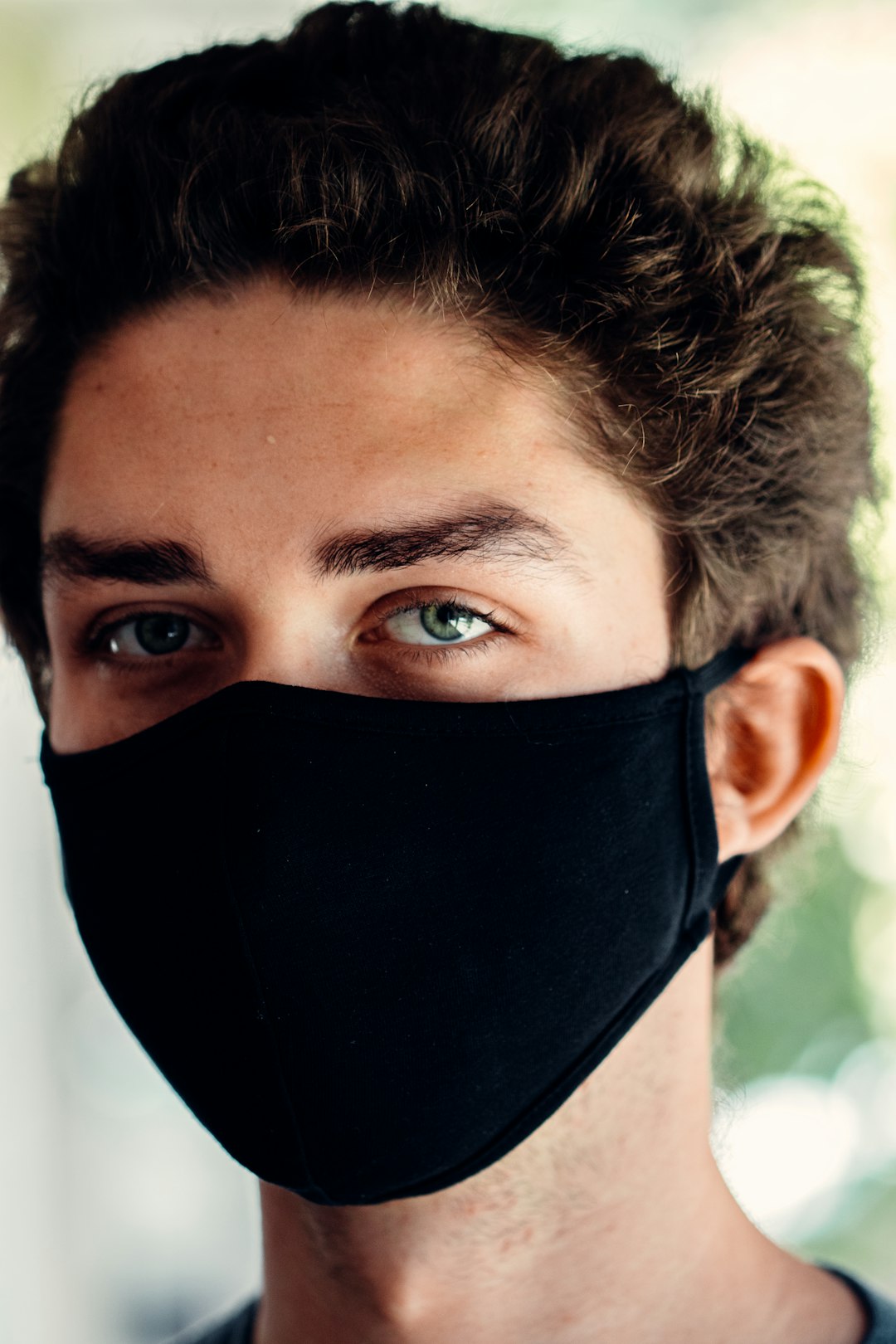 man in black face mask