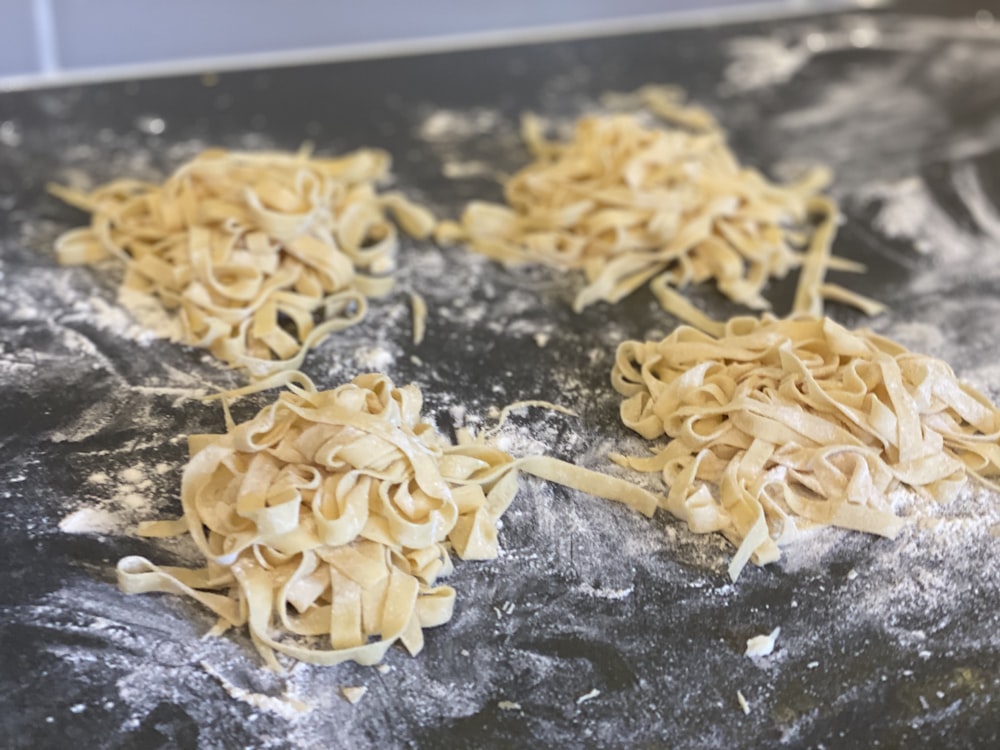 pasta on black rectangular tray