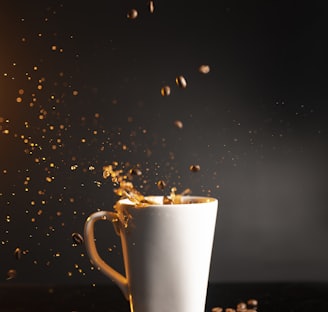 white ceramic mug with coffee