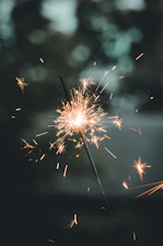 white and brown fireworks in the sky