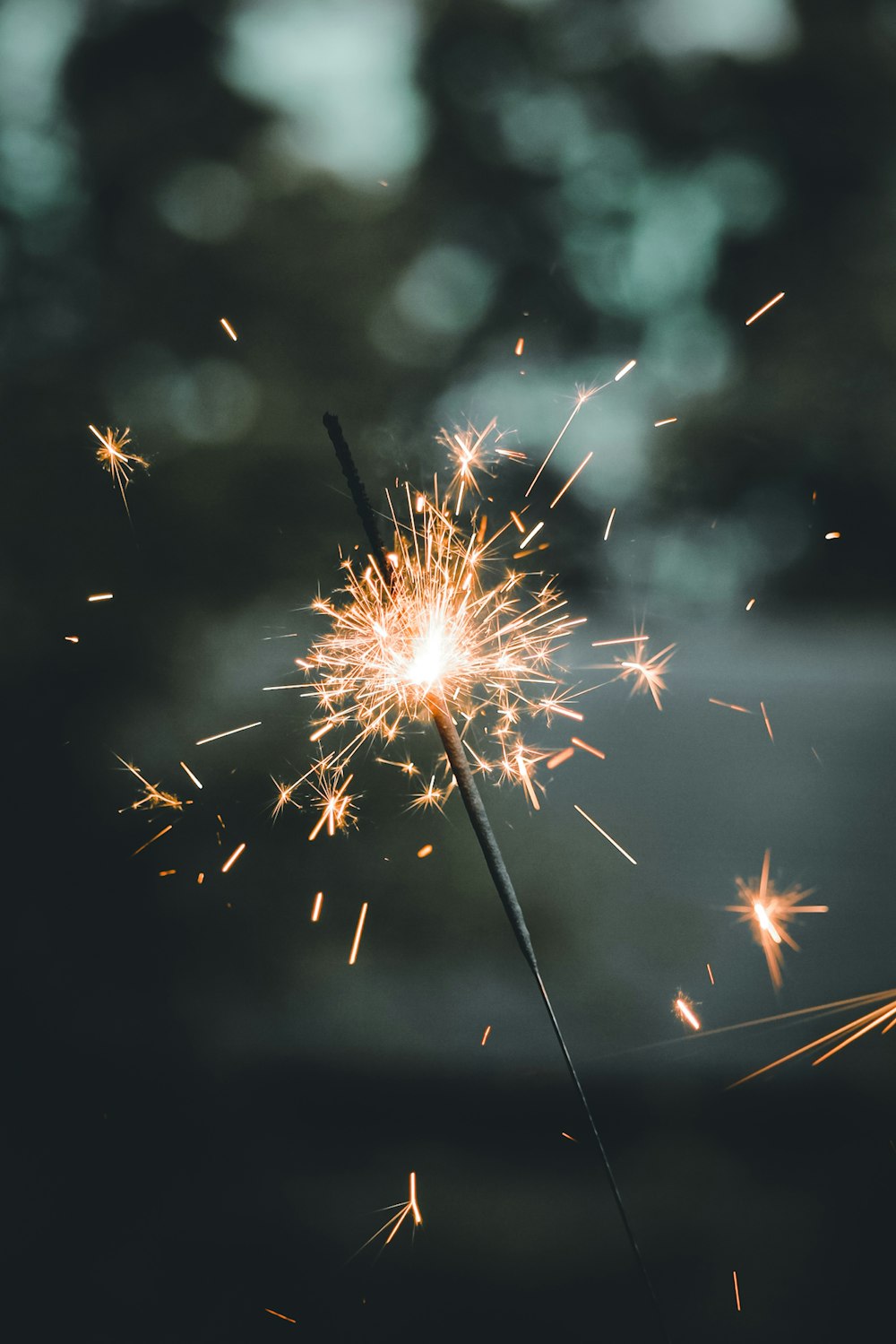 white and brown fireworks in the sky