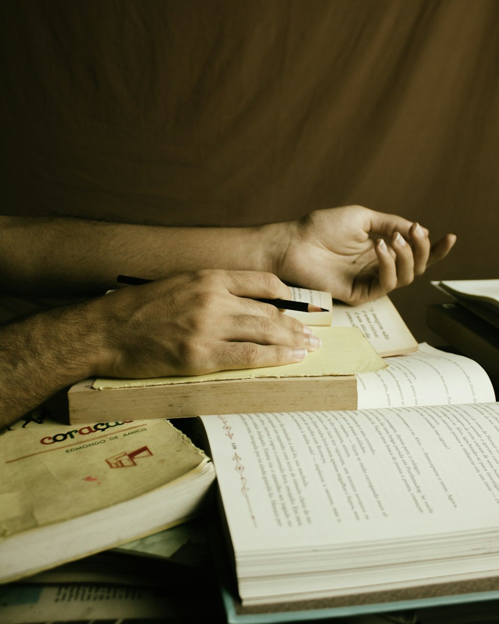 person holding white printer paper