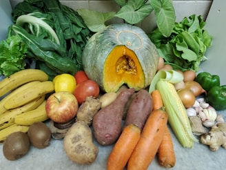 carrots and green vegetable on table
