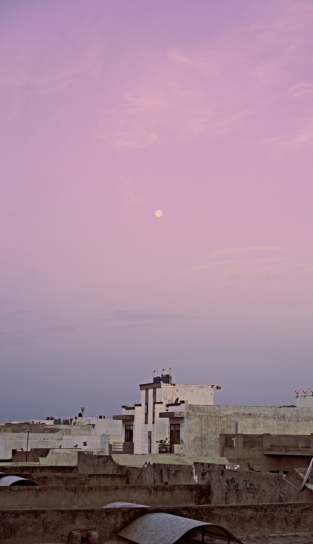 white concrete building under blue sky during daytime