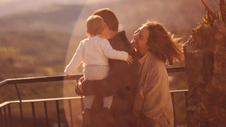 Family members sharing a peaceful moment together near the sacred sites
