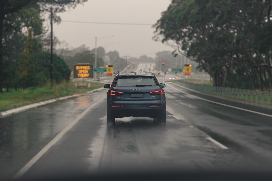 black car on road during daytime