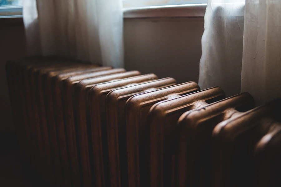 Modern radiator installation in a clean domestic setting