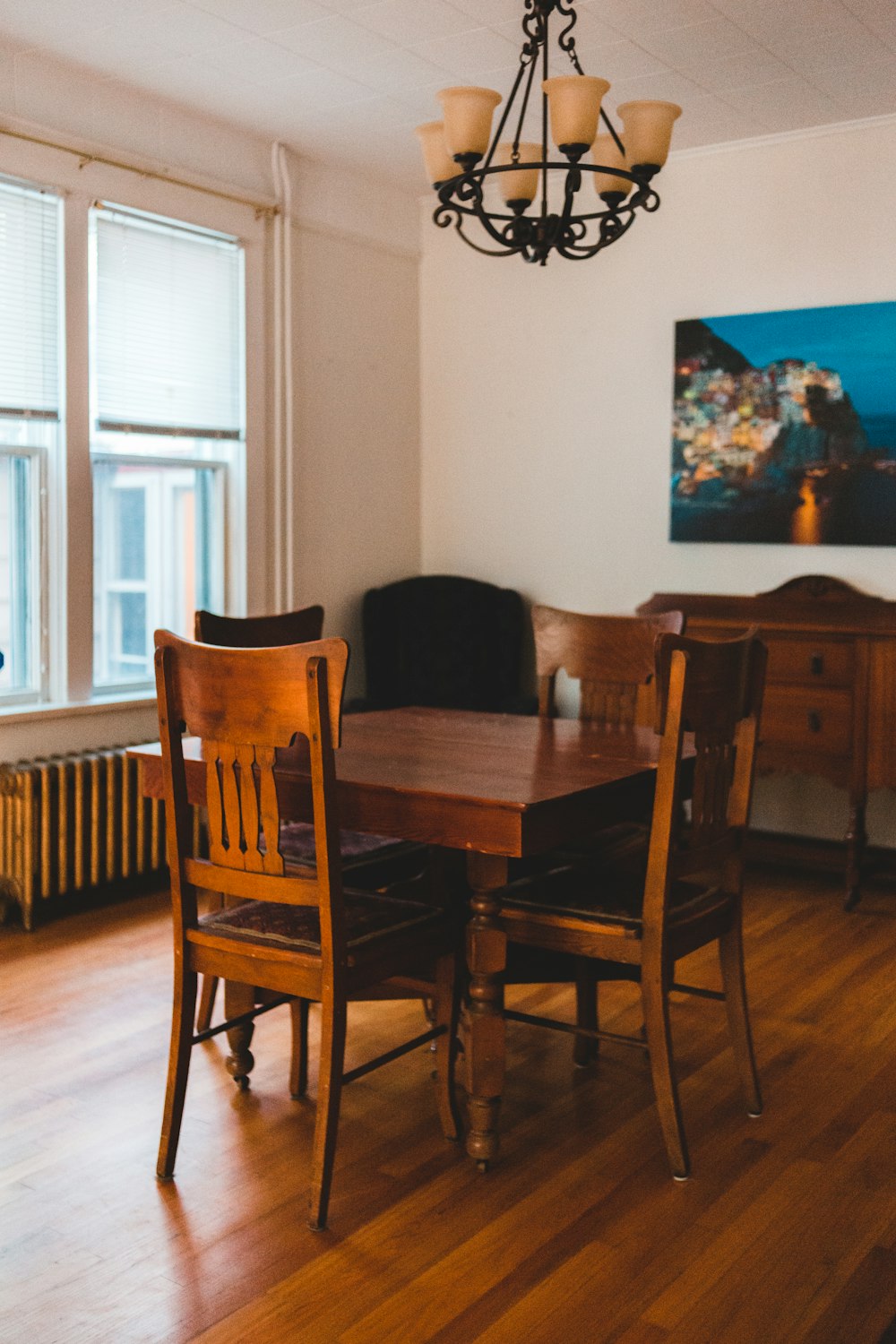 brown wooden dining table and chairs