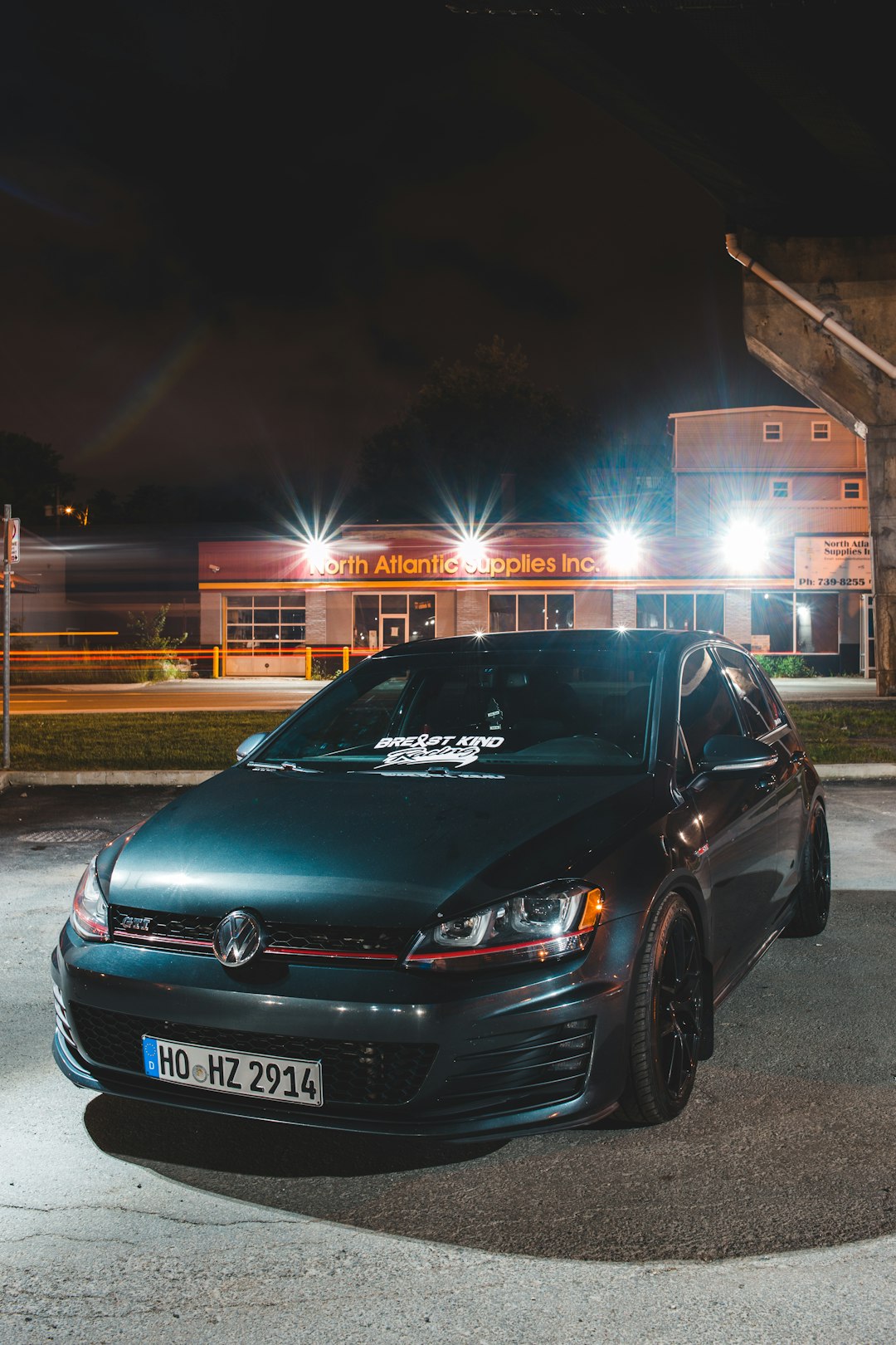 black honda sedan on road during night time