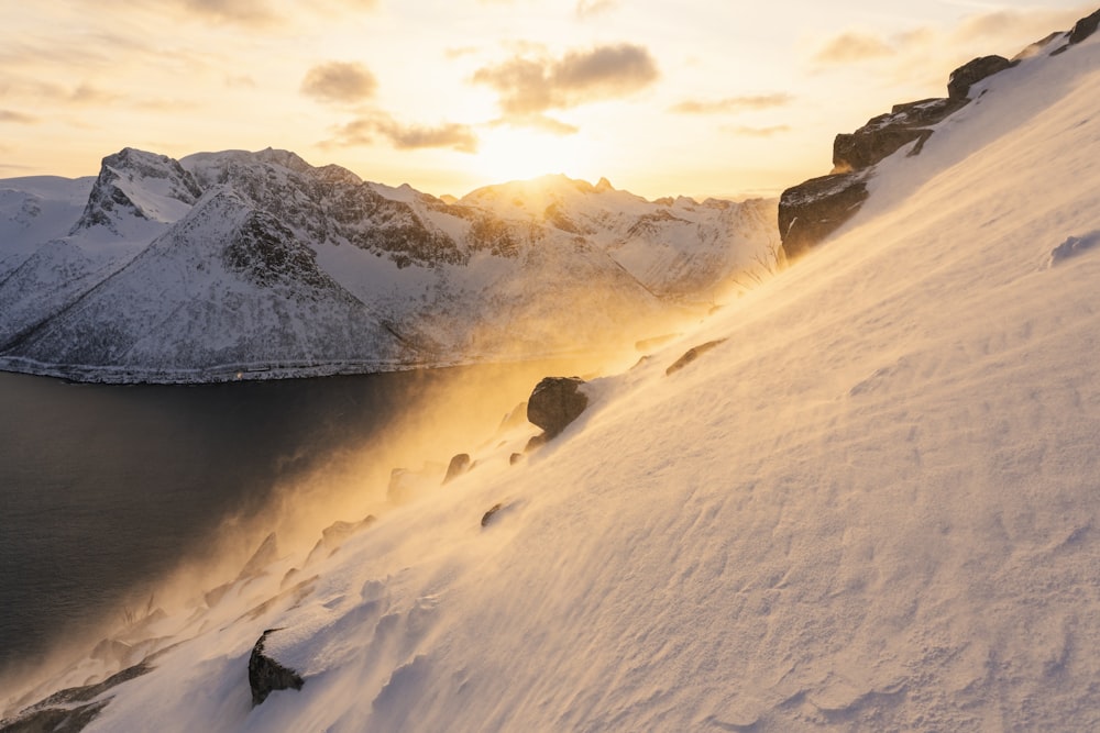 snow covered mountain during daytime