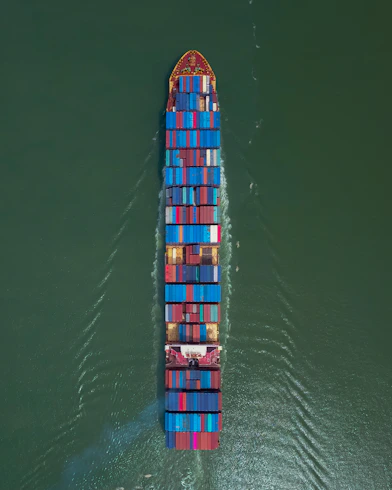 white and blue ship on sea during daytime