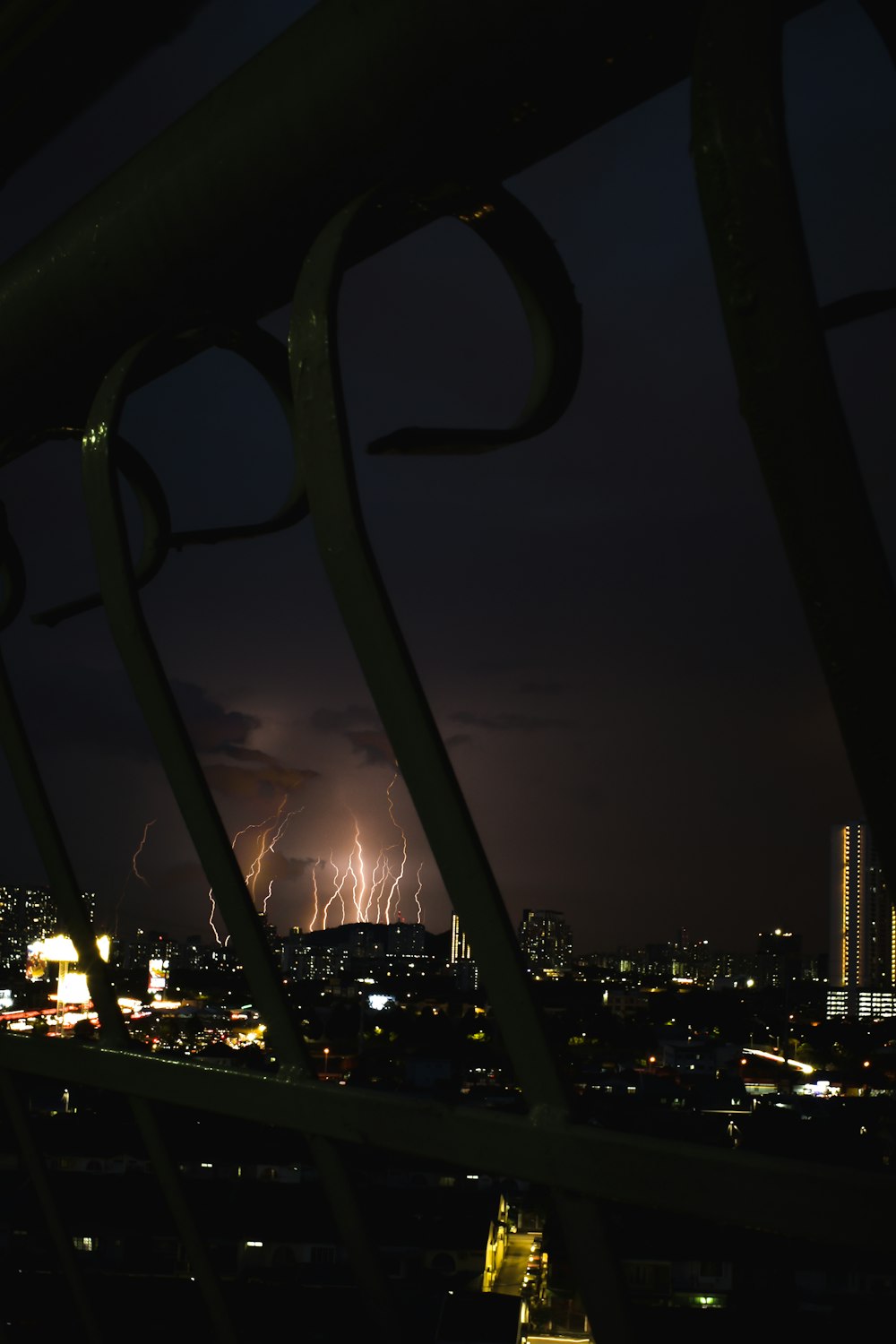 city with high rise buildings during night time