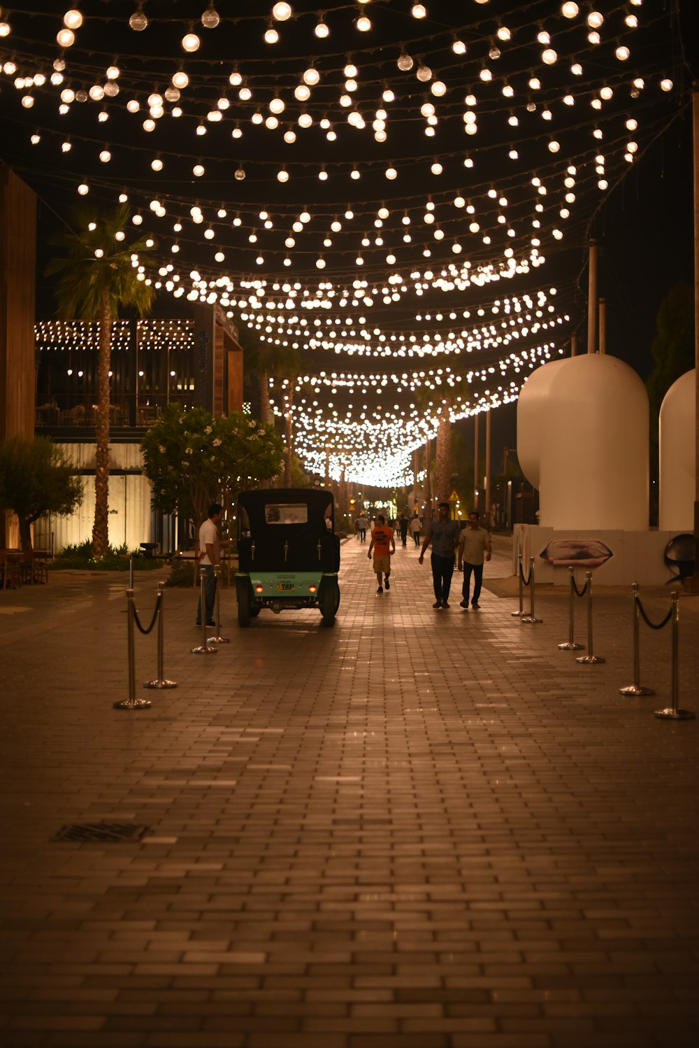 people walking on sidewalk during daytime