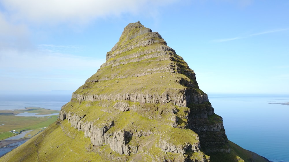 brown rock formation under blue sky during daytime