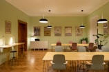 people sitting on chairs inside room