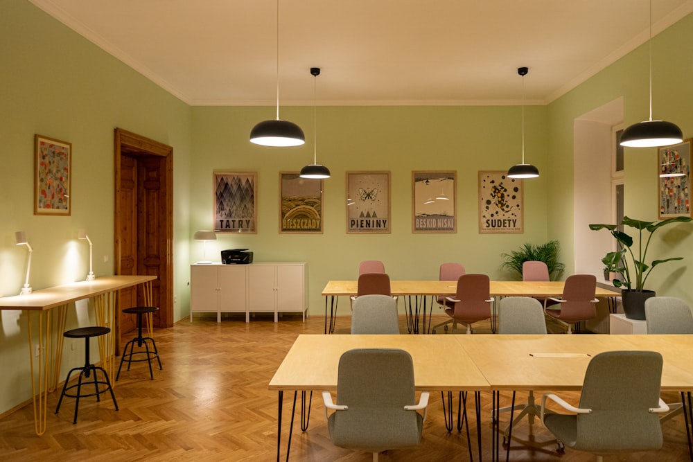 people sitting on chairs inside room