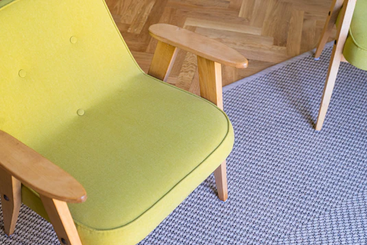 green padded brown wooden chair