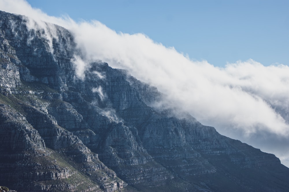 gray and white mountain under blue sky during daytime