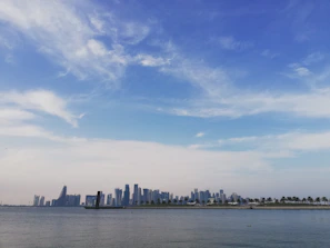 The modern skyline of Panama City with the famous Panama Canal in the foreground.