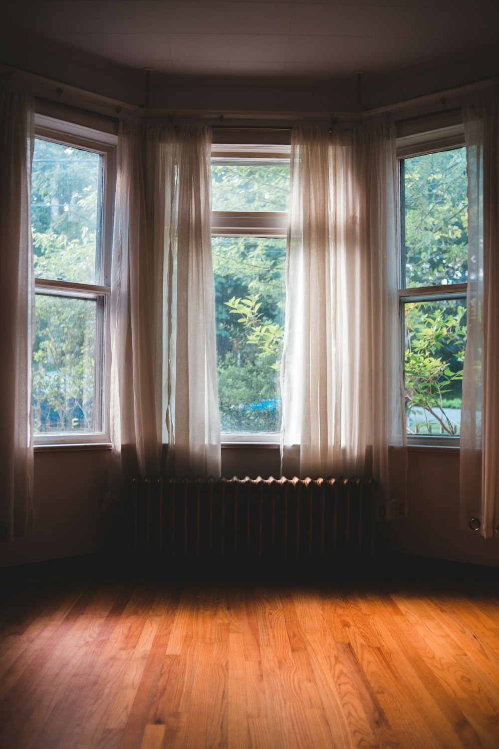 white wooden framed glass window