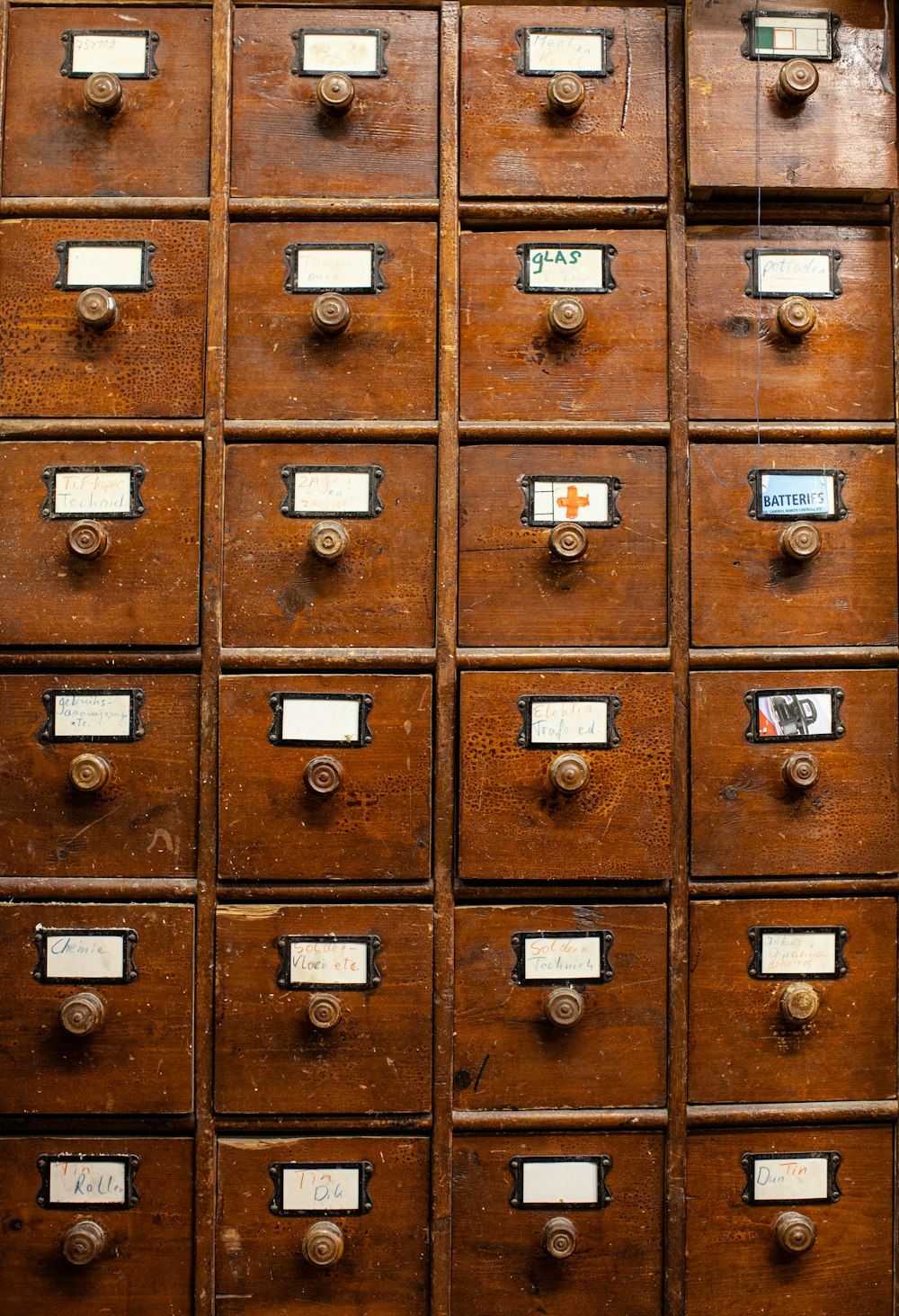 brown wooden locker with silver padlock