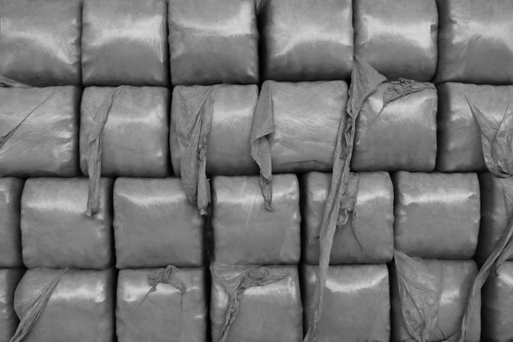 grayscale photo of a leather sofa