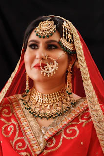 woman in gold and red sari