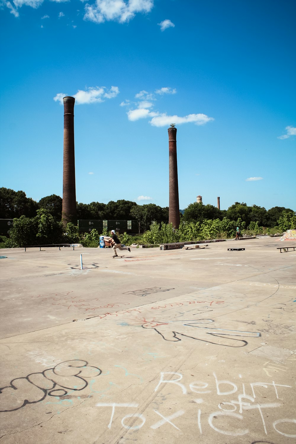 people playing basketball on park during daytime