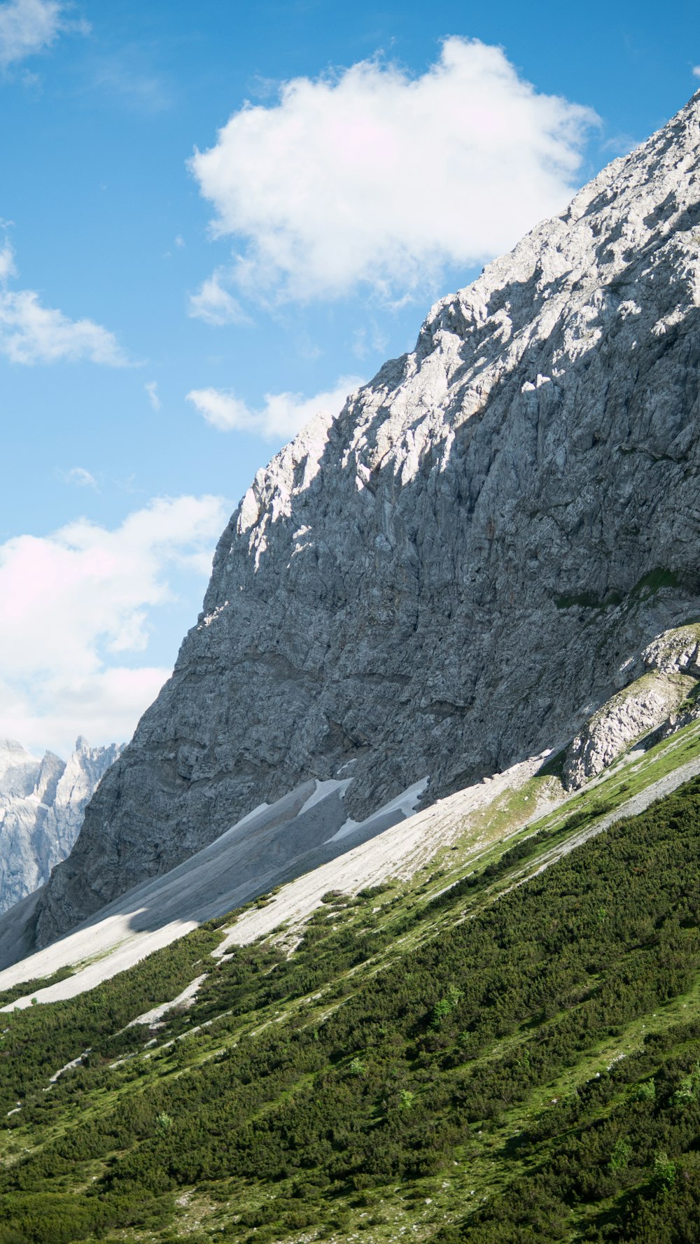 gray rocky mountain under blue sky during daytime