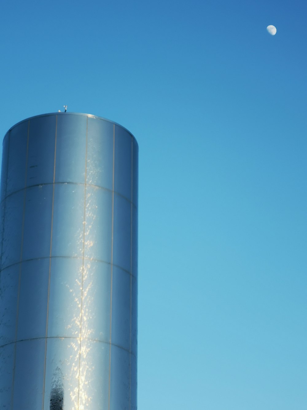 gray metal tank under blue sky during daytime