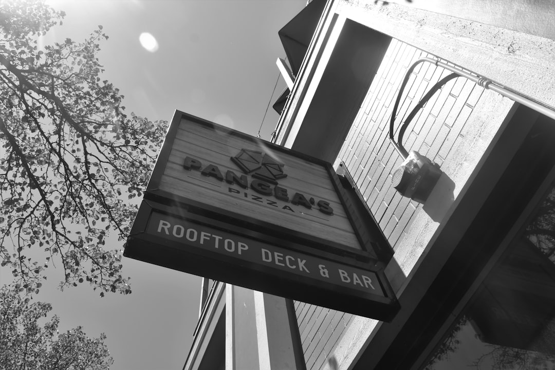 grayscale photo of black and white signage