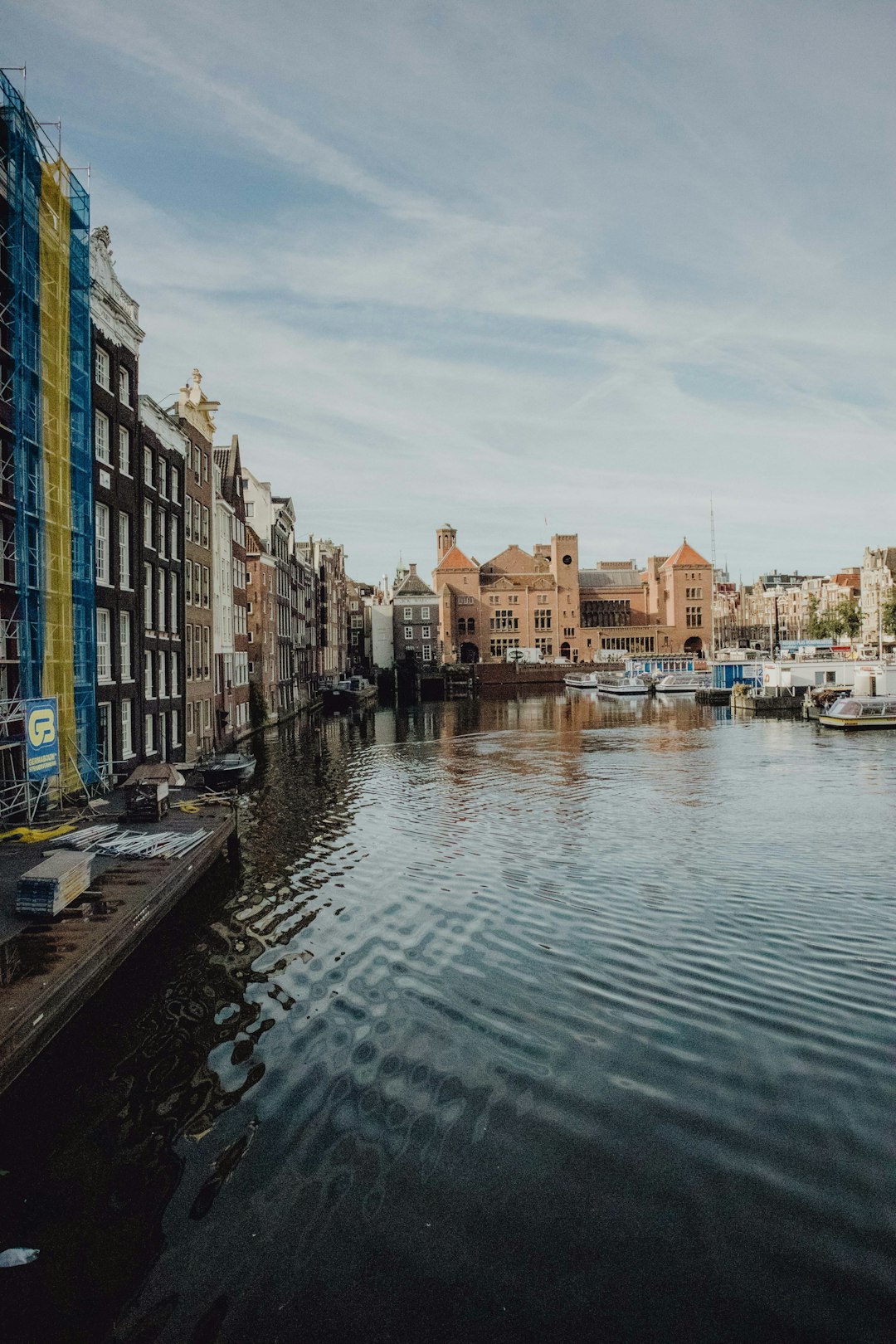 body of water between buildings during daytime