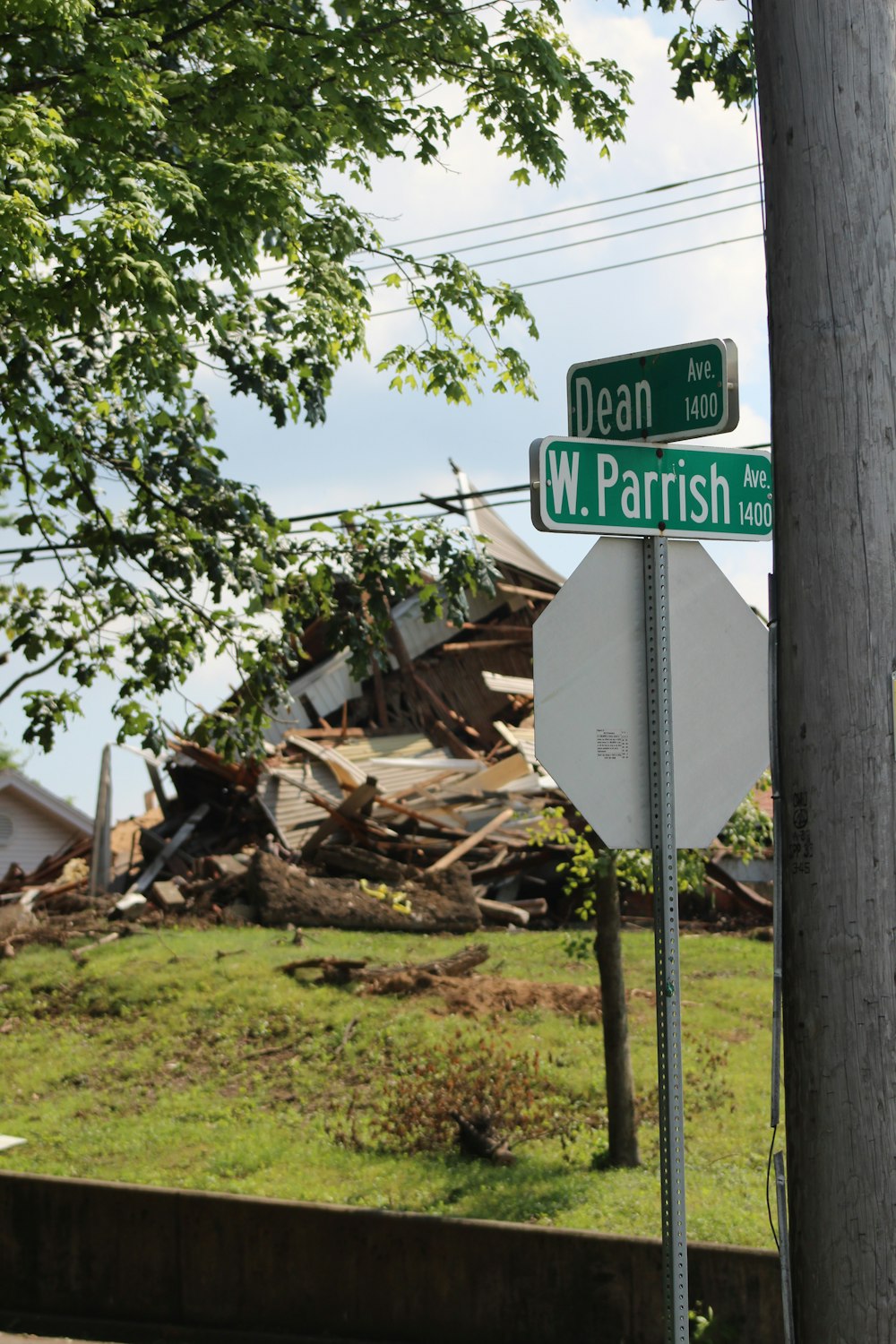 white and green street sign