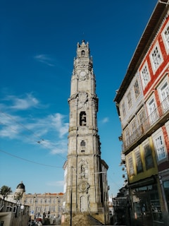 brown and white concrete building under blue sky during daytime