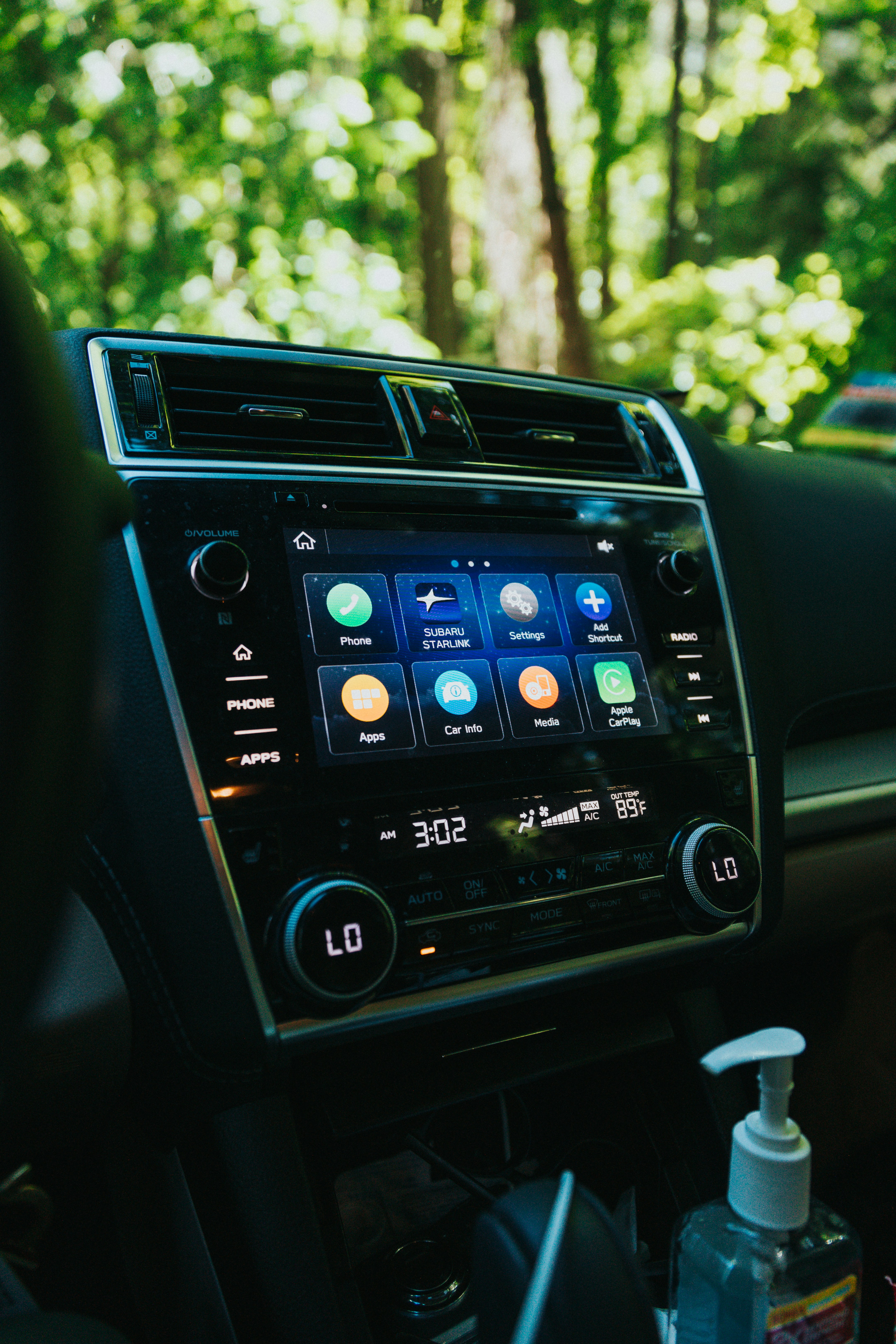 Car dashboard with a modern touchscreen stereo and connected infotainment controls