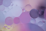 pink and white balloons on pink background