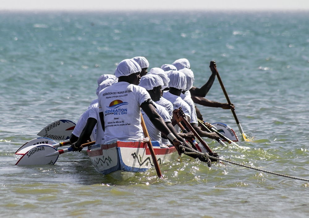 people riding on boat during daytime