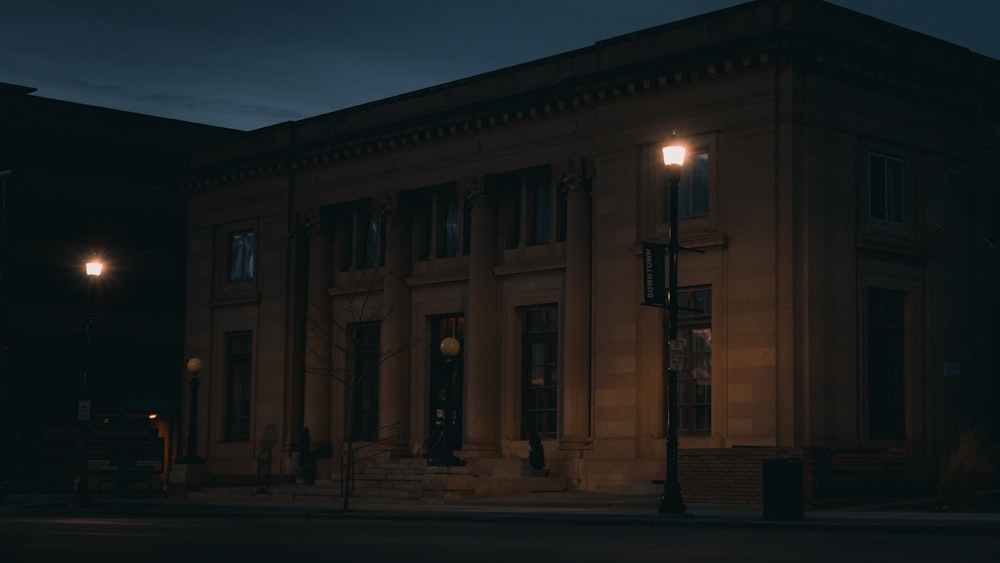 brown concrete building during night time