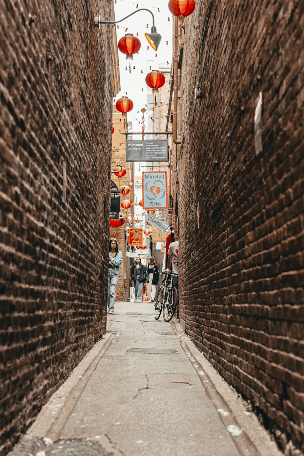Walking through Fan-Tan Alley in Victoria's historic chinatown between Pandora and Fisgard.