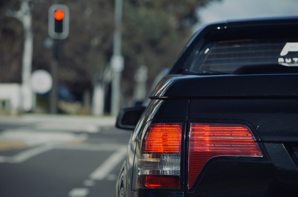 black car on road during daytime