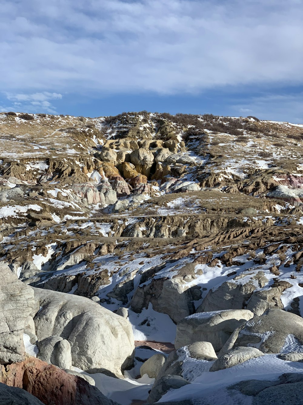 gray rocky mountain under blue sky during daytime