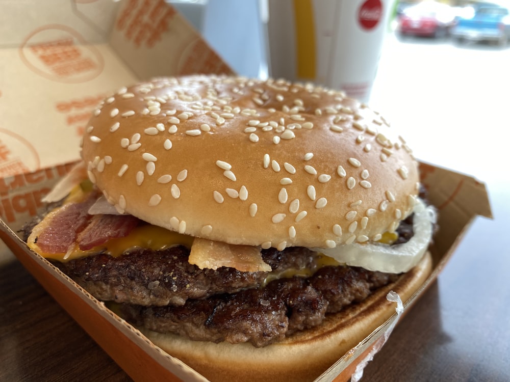 burger on brown wooden table