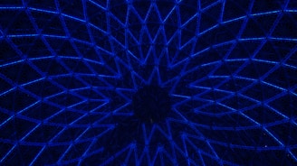 Elegant navy blue and gold geometric pattern framing a globe with diverse people connected by light beams.